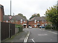 Approaching the junction of  Benham Drive  and Breech Close