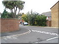 Curving wall at the junction of Benham Drive and Green Farm Gardens