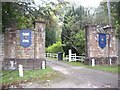 NH5243 : Beaufort Castle gates on A833 by Stanley Howe