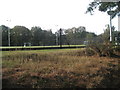 Looking from a footpath towards a hockey pitch at King Edward