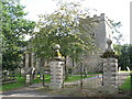 NZ0461 : Bywell St.Peter - entrance gates by Mike Quinn