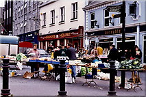 M2925 : Galway - Shops & street vendors selling produce by Joseph Mischyshyn