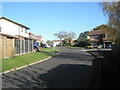 Approaching the junction of Grassmere Way and Cornbrook Grove