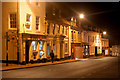 HSBC bank and shops on Market Hill at night