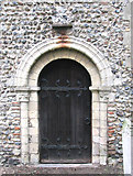 TM1596 : St Nicholas' church - the Norman south doorway by Evelyn Simak