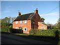 Red-brick cottage in Thorpe Road