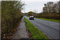 Low Bank Road with a bridge over the M6 ahead