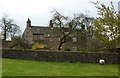 Cottages and sheep in field, Downham