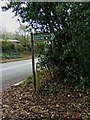 Public footpath sign by the A4133 road