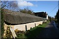 Thatched wall along the lane