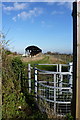 Gate to a footpath by Holywell Farm