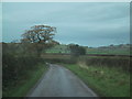 SS9101 : Open road south-west of Thoverton by Sarah Charlesworth