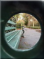 Talbot Woods: looking up Glenferness Avenue through bench ironwork