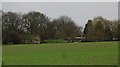 Farm buildings by the railway