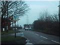 Minor road joins the A376 at Sandy Gate