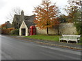 Bus shelter, phone box and bench in Hatherop