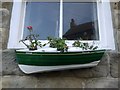 NZ7818 : 'Stonehaven' fishing coble planter, High Street by Andrew Curtis