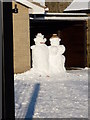 A handsome couple in the snow