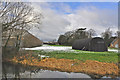 Corrugated iron shed on the banks of the River Slea