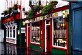 V9690 : Killarney - Laurels Singing Pub along Main St (N71) by Joseph Mischyshyn