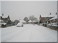 Looking up a snowy Talbot Road towards Hooks Lane