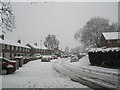 Bend in a snowy Woodgreen Avenue