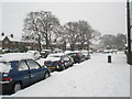 Snowy pavement in Woodgreen Avenue