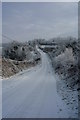 J1433 : Snow Covered Brae Road by Neil Mitchell