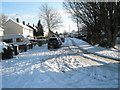 Mid section of a snowy Priorsdean Crescent