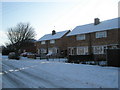 Snow covered homes in Barncroft Way