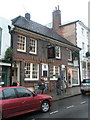 Umbrellas up outside  The Red Lion