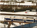 Wembley: eastbound train at Wembley Stadium Station