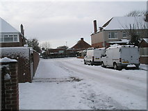 SU6605 : Approaching the junction of a snowy Mansvid Avenue and Court Lane by Basher Eyre
