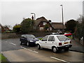 Looking from Hobbs Way across to a thatched cottage in Sea Lane