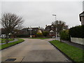 Approaching the junction of  Cove Road and Ladbrooke Close