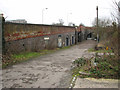 Lane alongside the railway bridge in Trowse