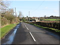 Looking E along Frith Road towards Clap Hill