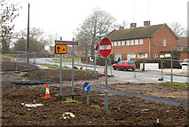 SP4976 : Defunct road signs 'marooned' by Andy F