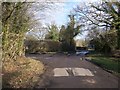 Lane junction near Chequertree Farm