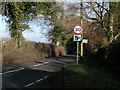 Start of the 30mph zone for West Hill, at Tipton Cross