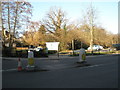 Road and path junction at the bottom of Weydown Road