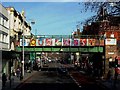 Painted Railway Bridge in Brixton ... "B(e) Our Guest"