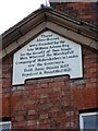 Commemorative stone on almshouses, High Street