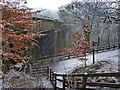 Dell Road as it passes under Spodden Viaduct