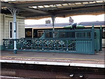 TQ2877 : Cast -iron bannister and heavy gates on Platform 2 at Battersea Park Station by tristan forward