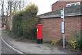 Bus stop by the postbox