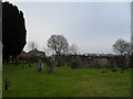 Gravestones in  the churchyard at St Mary, East Worldham