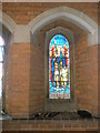 Stained glass window by the side altar at St Matthew