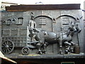 Stables Market bronze relief