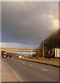 Bridge over the A4229,  and stormy weather